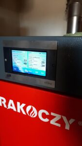 Moc palnika z ustawień PRACA i PRZERWA podajnika